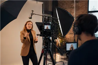 A business owner filming video content for social media